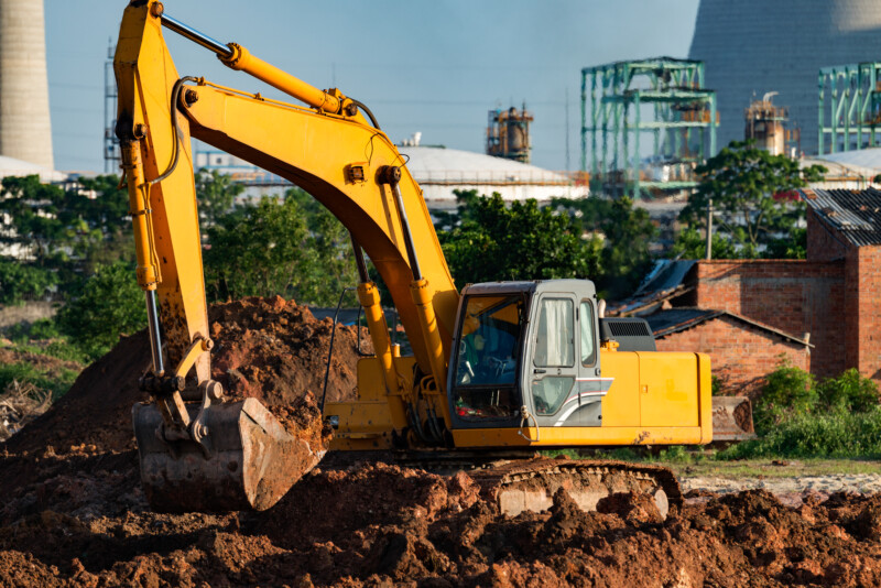 Excavators are assignments and refinery background