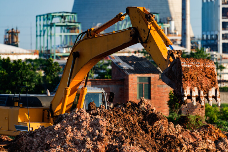 Excavators are assignments and refinery background